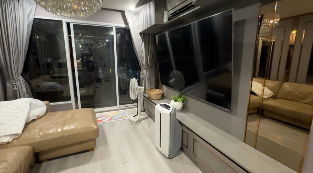 For sale or rent: Happy Condo Ladprao 101. Fully furnished unit with spacious living area, 4th floor, pool view, and large balcony. Book now!
