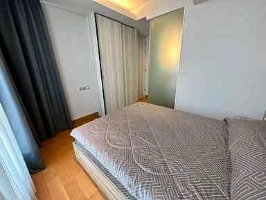 For sale or rent: The Lumpini 24, a very high floor room with a great city view and excellent furniture. First come, first served.
