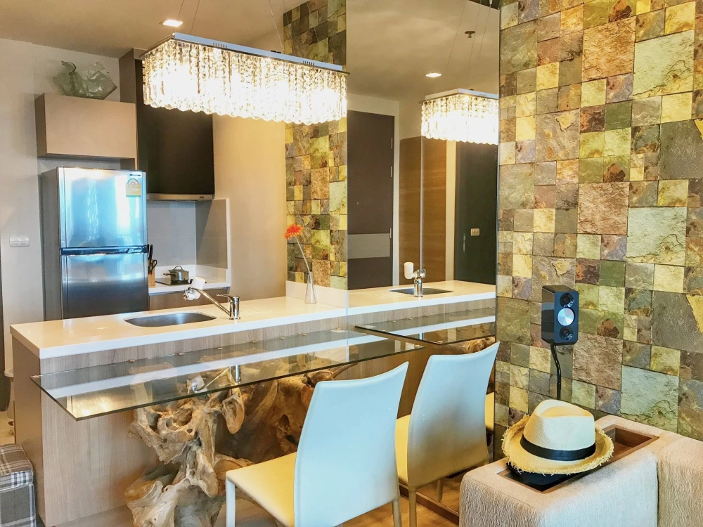 For sale or rent: Rhythm Sathon condo, spacious unit with ample living space, 33rd floor with high-floor views. Book yours today!