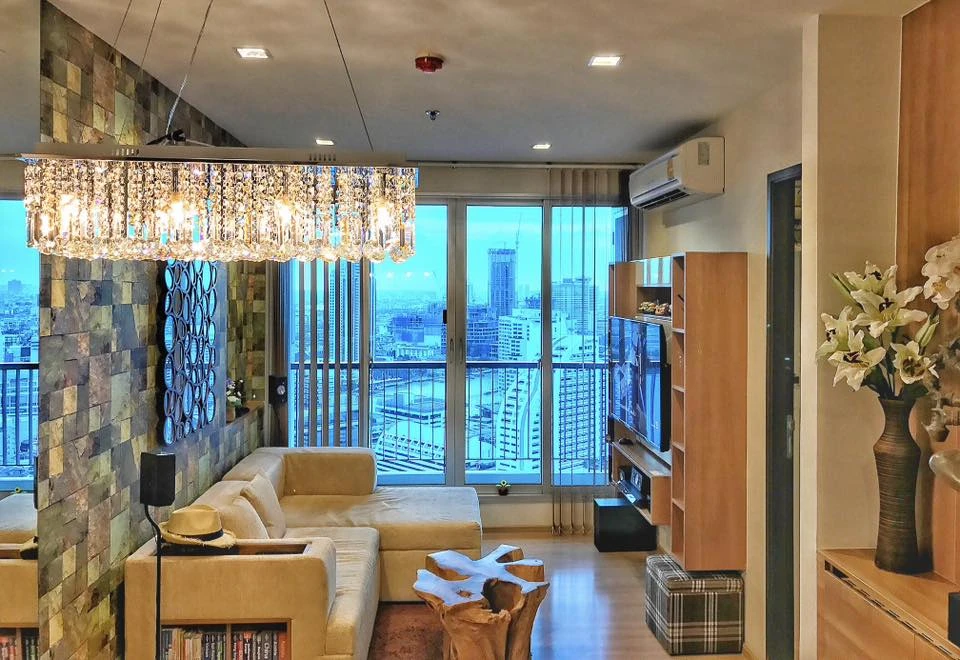 For sale or rent: Rhythm Sathon condo, spacious unit with ample living space, 33rd floor with high-floor views. Book yours today!
