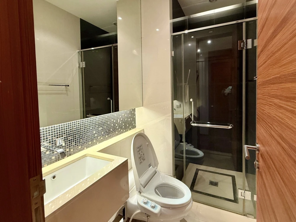 For sale or rent: The Address Sukhumvit 28 condo. Corner unit offering privacy and spacious living area. Book now, don't miss out!