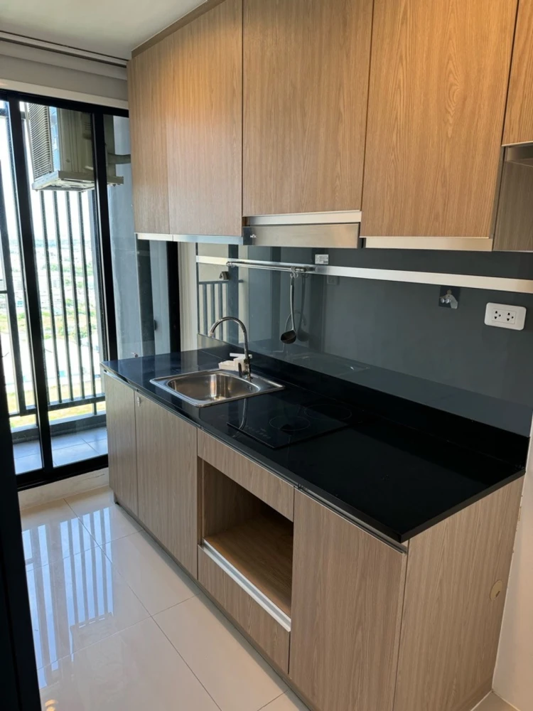 For sale or rent: Niche Mono Sukhumvit Bearing condo. Spacious unit with ample living space on the 31st floor, offering great views. Book now, don't w