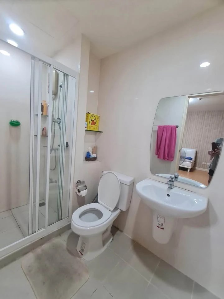 For sale: I-Condo Sukhapiban 2, with wallpaper in a very cool pattern throughout the room. The room is on the 2nd floor, next to the fire exit, defini
