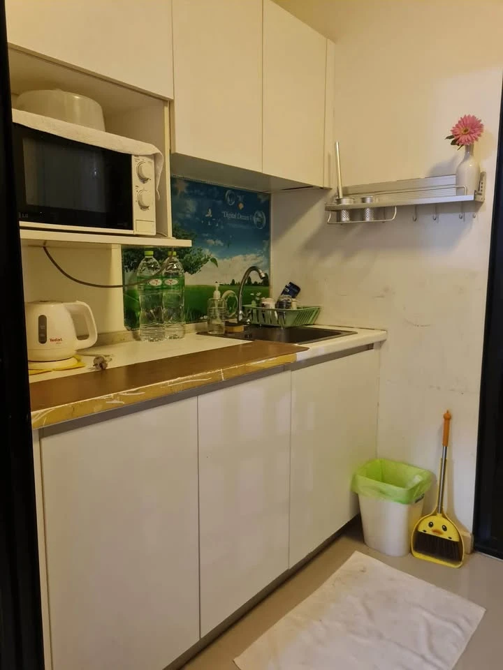 For sale: I-Condo Sukhapiban 2, with wallpaper in a very cool pattern throughout the room. The room is on the 2nd floor, next to the fire exit, defini