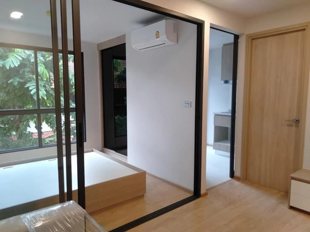 Cocoon Rama 9 condo for sale or rent. The unit is partitioned into separate, well-defined zones. Great price! Book yours today!