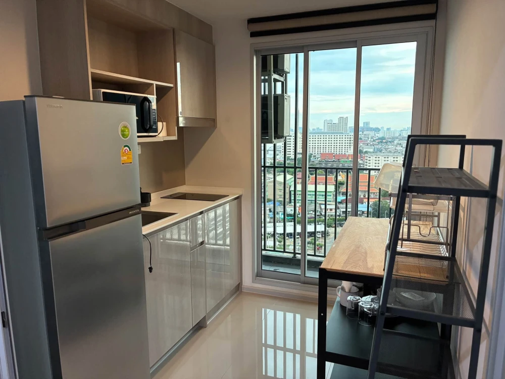 Condo for sale at Ideo Charan 70 - Riverview, 16th floor. Features a separate, enclosed kitchen; comes fully furnished with appliances. Book now!