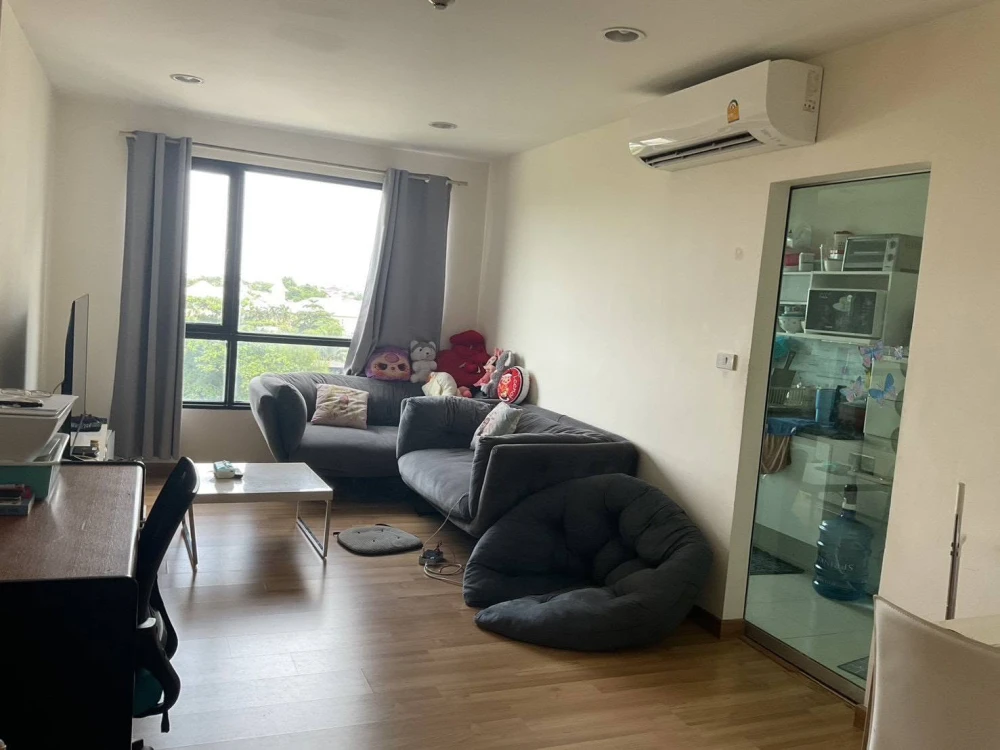 The cheapest condo for sale in the Kaset-Nawamin area at Premio Prime. Corner unit with a beautiful view overlooking Avenue Kaset-Nawamin.