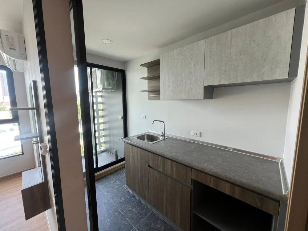 Condo for rent at THE CUBE LOFT Srinakarin - Theppharak. The unit is partitioned into separate, well-defined zones. Great price! Book now!