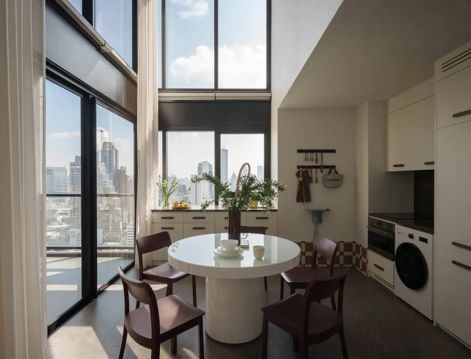 For rent: The Lofts Silom Duplex, 2 bedrooms, 2 bathrooms, 5.6-meter high ceilings, 29th floor, East-facing with city view. Book now!
