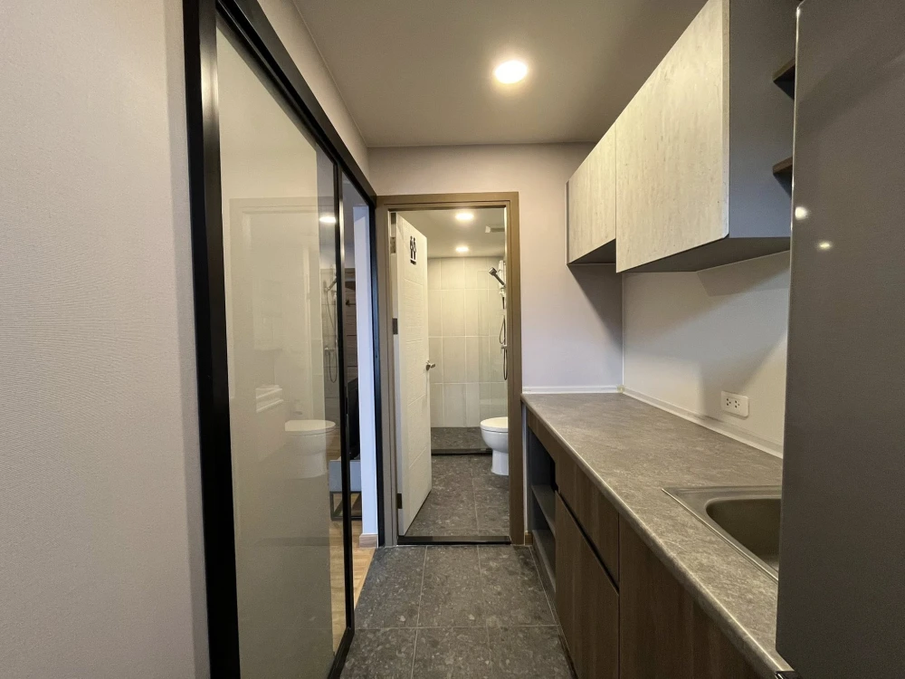 Condo for rent at The Cube Loft Srinakarin. The unit is partitioned into separate zones, ready to move in with just your luggage.