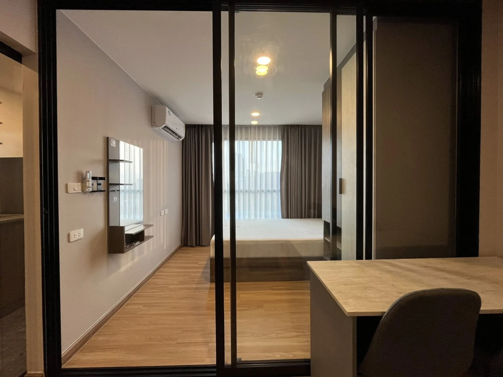 Condo for rent at The Cube Loft Srinakarin. The unit is partitioned into separate zones, ready to move in with just your luggage.