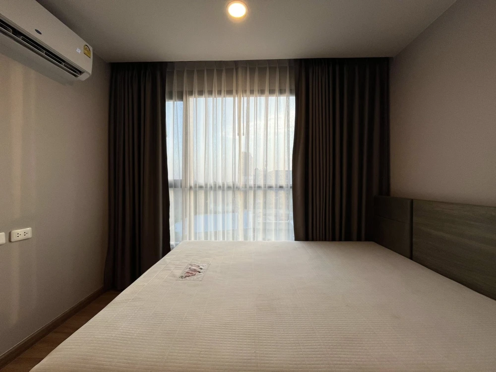 Condo for rent at The Cube Loft Srinakarin. The unit is partitioned into separate zones, ready to move in with just your luggage.