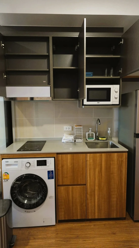 Condo for rent at The Livin Phetkasem. Spacious and comfortable unit with ample living space. Convenient and fully equipped. Don't miss out!
