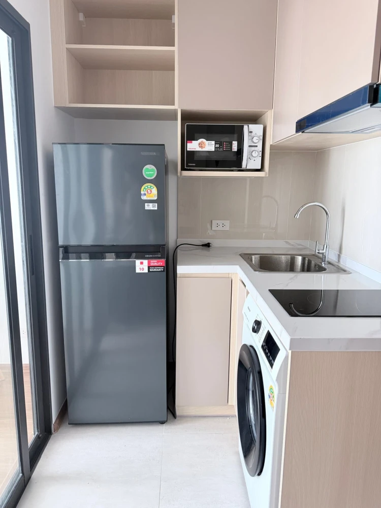 Condo for rent at The Living Ramkhamhaeng. The unit is partitioned into separate, well-defined zones. Great price! Book now!