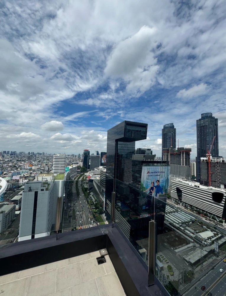 For rent: Ashton Asoke-Rama 9, top-floor unit with expansive glass balcony and fully furnished with built-in features. Book now!