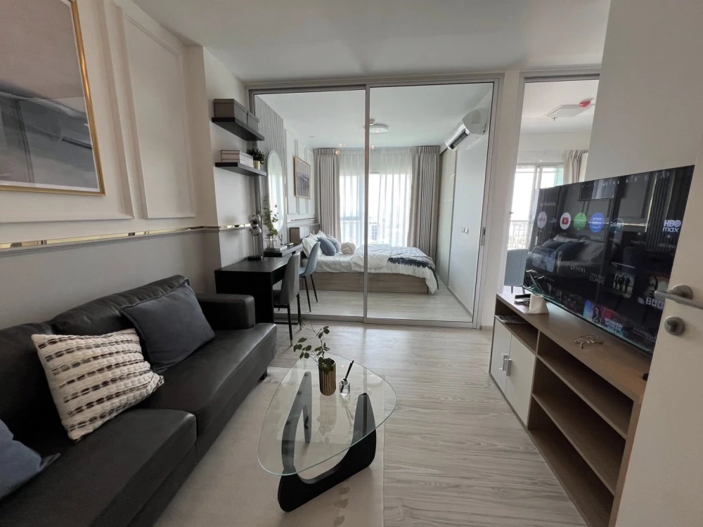 For rent: Aspire Rattanathibet 2, beautifully decorated two-bedroom unit with high-quality built-in furniture. Don't miss out!