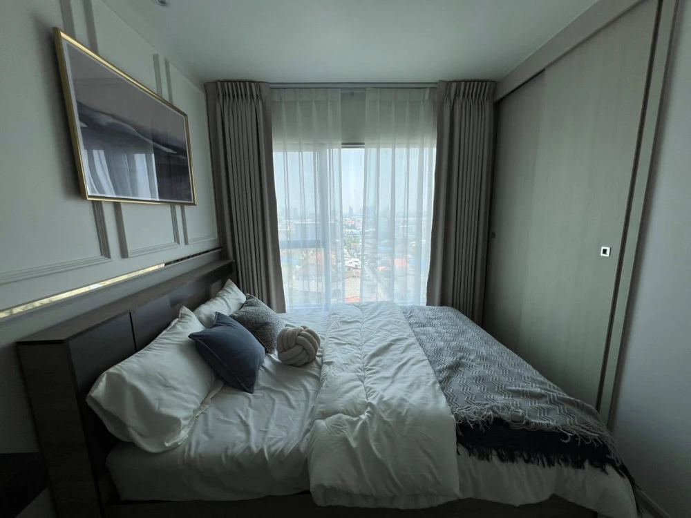 For rent: Aspire Rattanathibet 2, beautifully decorated two-bedroom unit with high-quality built-in furniture. Don't miss out!