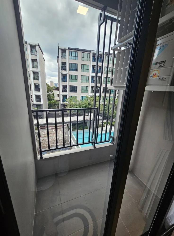 For rent: Atmoz Palacio Lat Phrao Wang Hin, 1 bed plus, 5th floor, swimming pool view, garden view, very good breeze, come and reserve now, don't dela