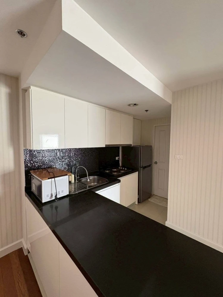 For rent: Belle Grand Rama 9, 2 bedrooms, spacious living area, great location, convenient transportation. Don't miss out!