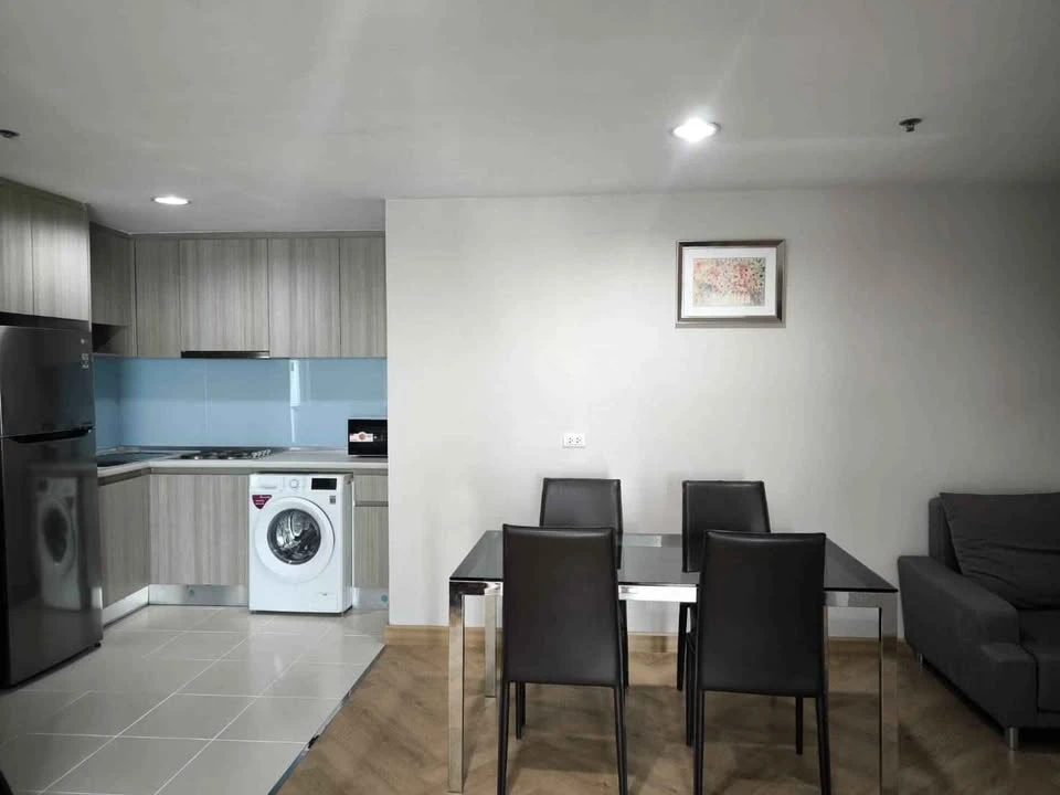 For rent: Belle Grand Rama 9, very high floor unit with view of Government Savings Bank, 2 bedrooms. Don't miss out!