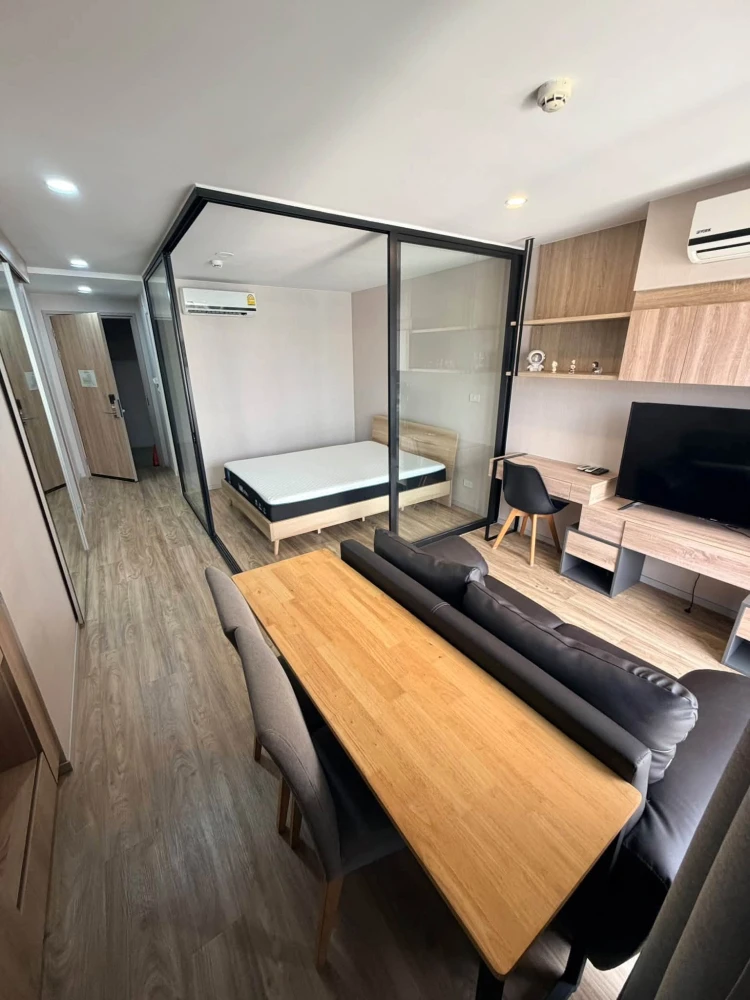 For rent: Blossom Condo @ Sathorn–Charoenrat. Features a separate living area and a balcony. Equipped with a premium-grade mattress that offers excell images