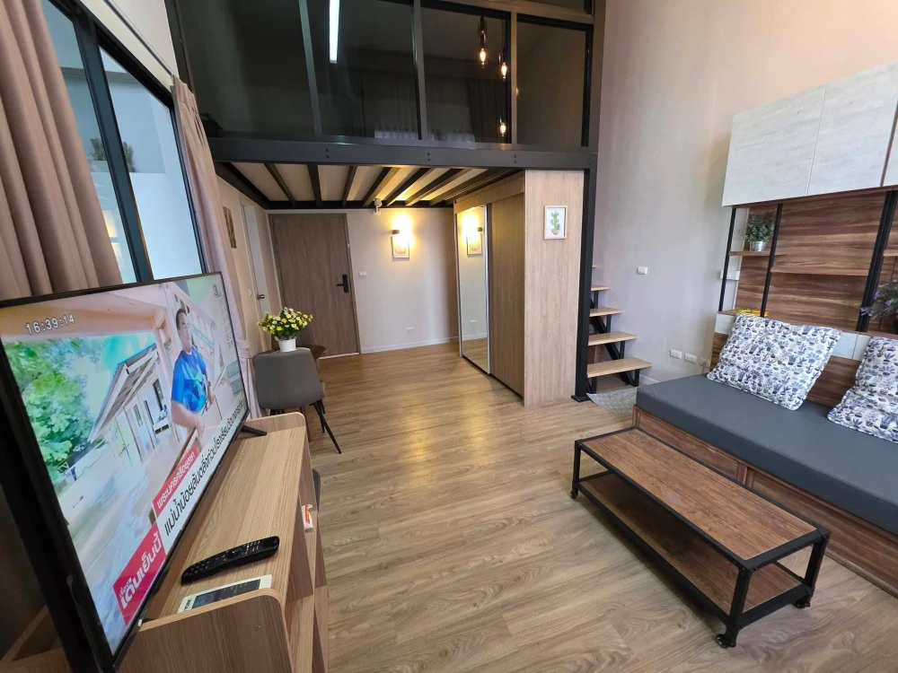 Blossom Condo @Fashion Altitude for rent. Well-partitioned layout featuring a glass-enclosed upper level, a kitchen adjacent to the balcony, and a sho