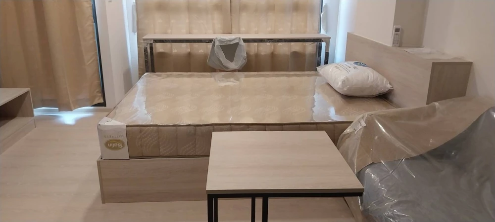 For rent: D Condo Ramkhamhaeng 40, studio room, 6th floor, clear view, good breeze, fully furnished, ready to move in.