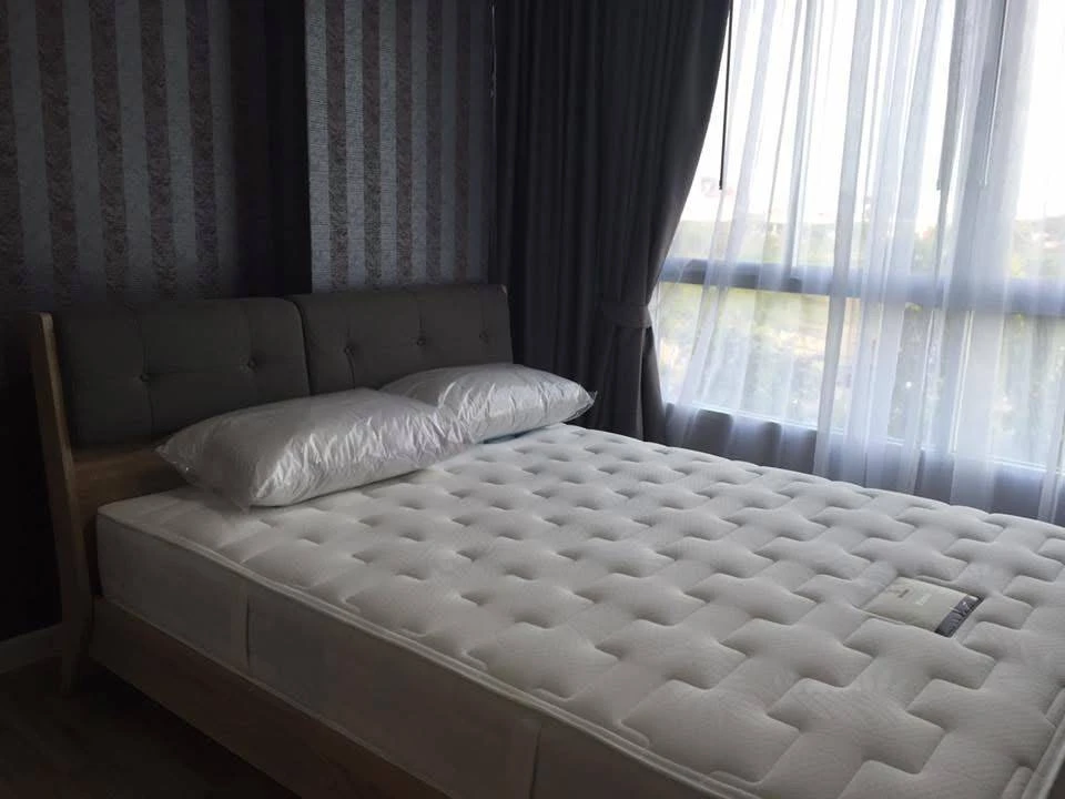For rent: D Condo On Nut-Rama 9, corner unit offering privacy, high-quality wallpaper, pool view. Don't miss this great opportunity! images