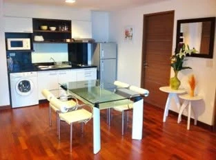 Modern 2-bedroom apartment for rent at DLV Thonglor. Spacious living room with open kitchen. You can't miss this!