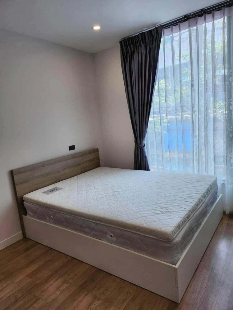For rent: Groove Ratchada-Rama 9, 2 bedrooms, spacious living area, fully furnished. Don't miss out!