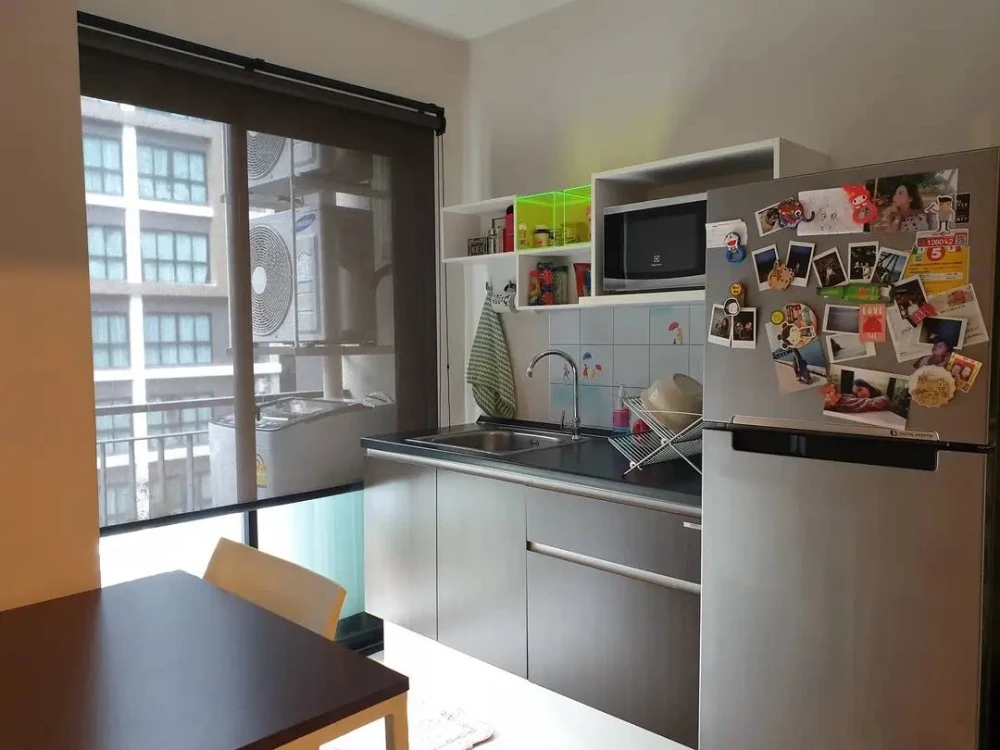 HallMark Ngamwongwan condo for rent, 4th floor (North facing), next to the fire escape. The room is cool, quiet, and very livable.