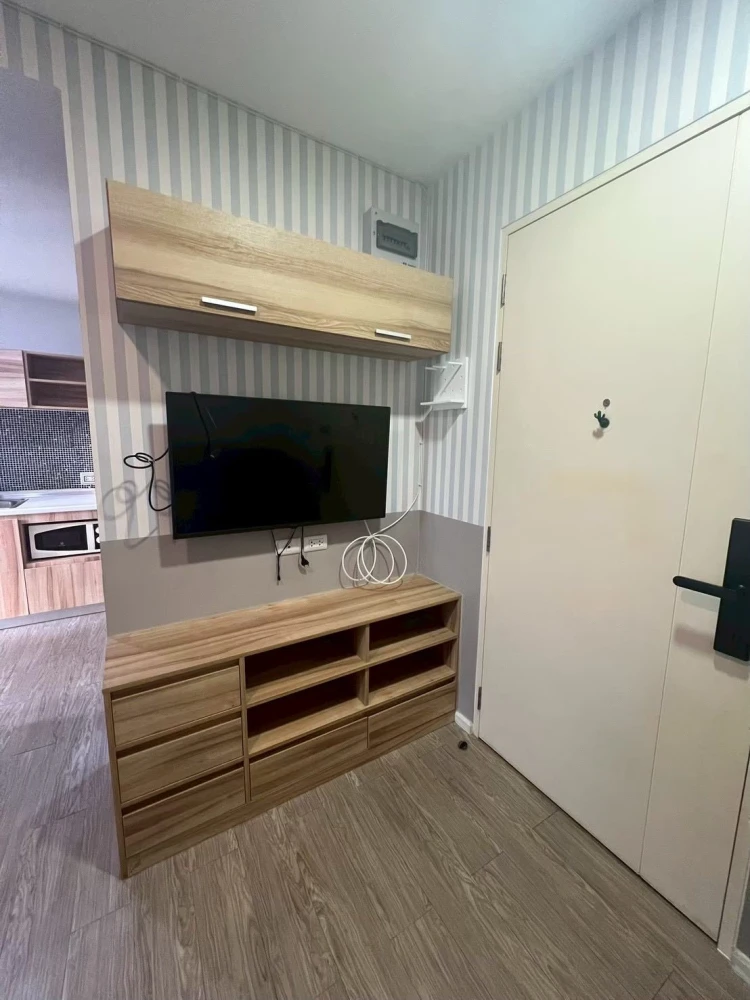 For rent: Happy Condo Donmuang The Terminal, 1st floor unit, fully furnished, high-quality wallpaper. Don't miss out!