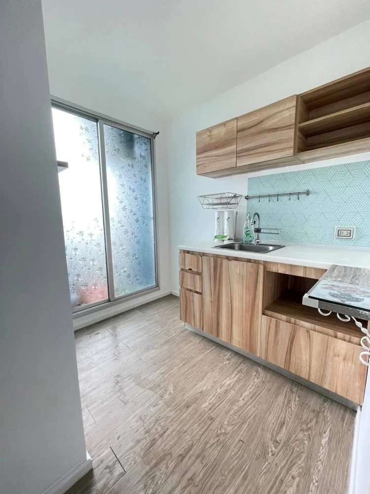 For rent: Happy Condo Donmuang The Terminal, a nice room with built-in wooden furniture, good location, don't miss it.
