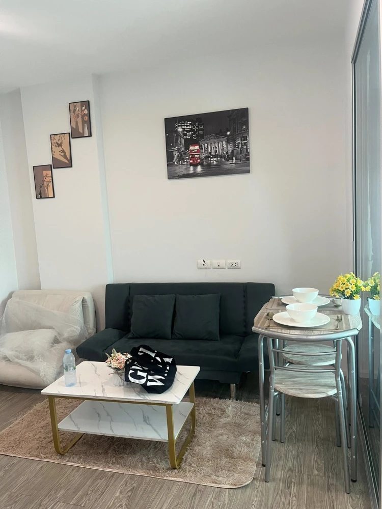 For rent: Happy Condo Donmuang The Terminal, a lovely room with complete furniture and appliances. Don't miss it!