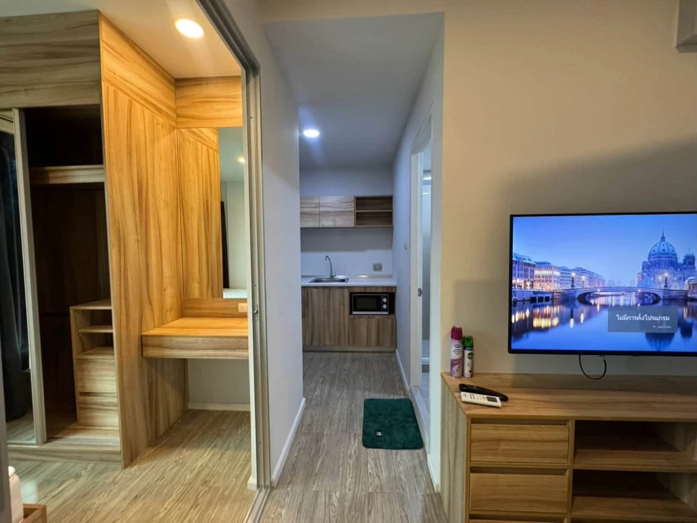 For rent: Happy Condo DonMueang The Terminal, 7th floor, with communal pool view, fully furnished and ready to move in.