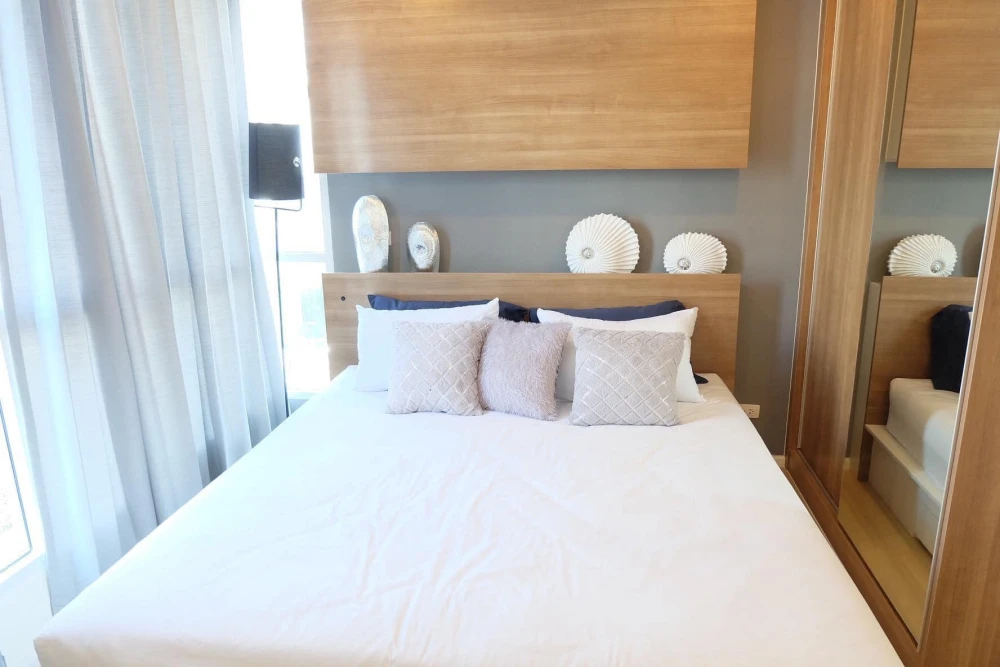 For rent: Happy Condo Ladprao 101, 2 bedrooms, spacious living area, beautifully furnished and fully equipped. Don't miss out, book now!