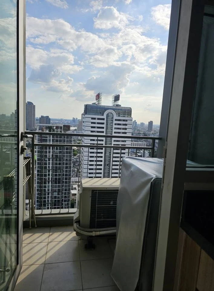 For rent: Hive at Sathorn, 31st floor. Stunning city views from a high vantage point. Spacious living area. Fully furnished and ready to move in.