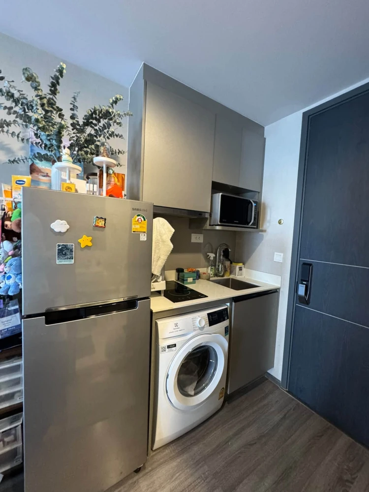 For Rent: IDEO Mobi Rangnam. Features a view of Soi Rangnam and comes fully furnished with all appliances—just bring your suitcase and move right in.