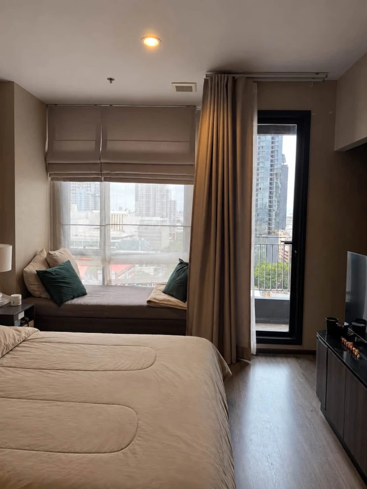 For Rent: IDEO Mobi Rangnam. Features a view of Soi Rangnam and comes fully furnished with all appliances—just bring your suitcase and move right in.