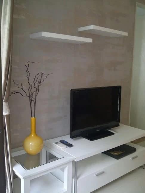 For rent: Ideo Ladprao 17. Spacious and comfortable room with high-quality wallpaper and a relaxing pool view. You definitely need to book this one!