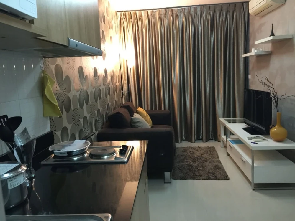For rent: Ideo Ladprao 17. Spacious and comfortable room with high-quality wallpaper and a relaxing pool view. You definitely need to book this one!