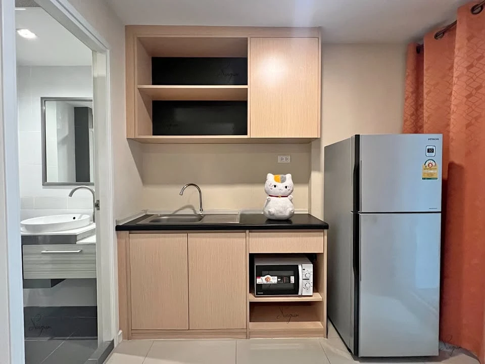 For rent: JW Condo @ Donmuang. Living room with mercury film for added privacy. Must arrange.