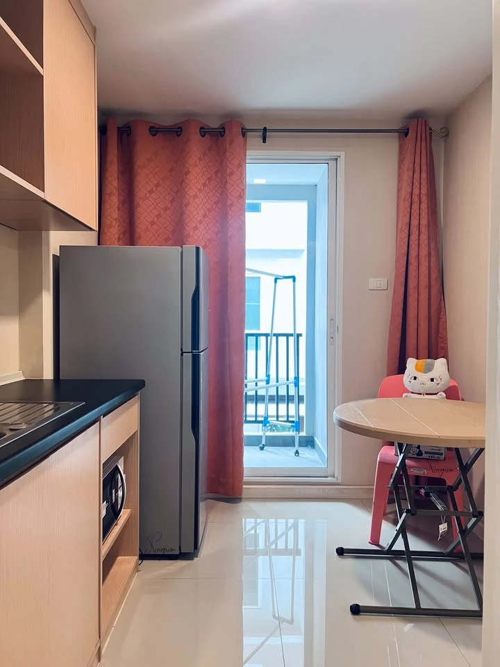 For rent: JW Condo @ Donmuang. Living room with mercury film for added privacy. Must arrange.