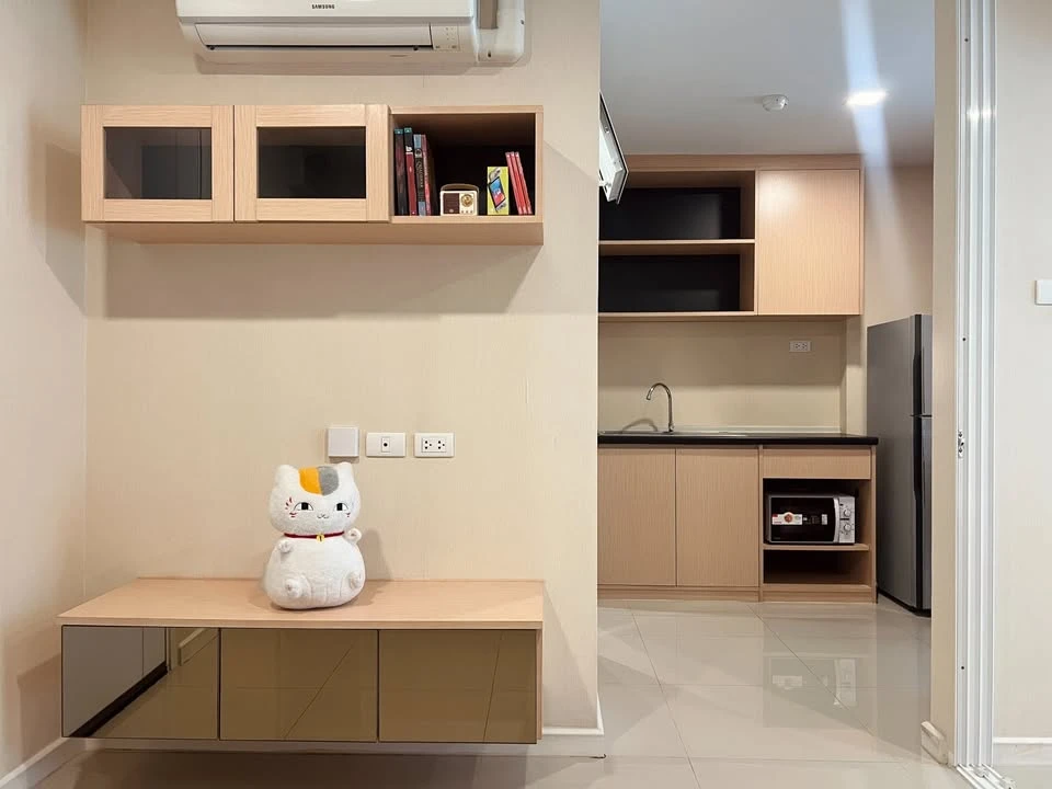 For rent: JW Condo @ Donmuang. Living room with mercury film for added privacy. Must arrange.