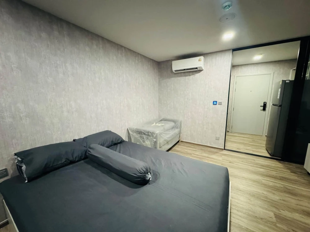 For Rent: Kave Embryo Rangsit. Features an open, breezy balcony with no obstructing neighbors and a large built-in wardrobe. Book now!