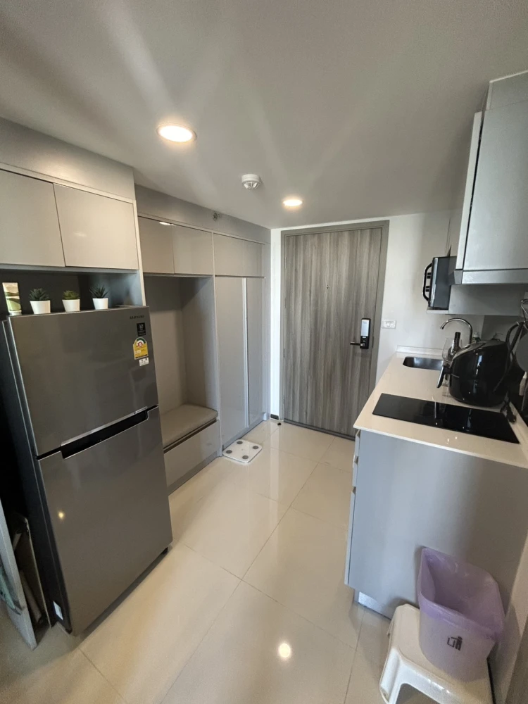 For rent: KnightsBridge Space Rachayothin. Spacious room with high ceilings, fully furnished, and beautiful view. Book now!