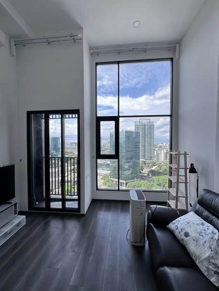 For rent: KnightsBridge Space Rachayothin. Spacious room with high ceilings, fully furnished, and beautiful view. Book now!