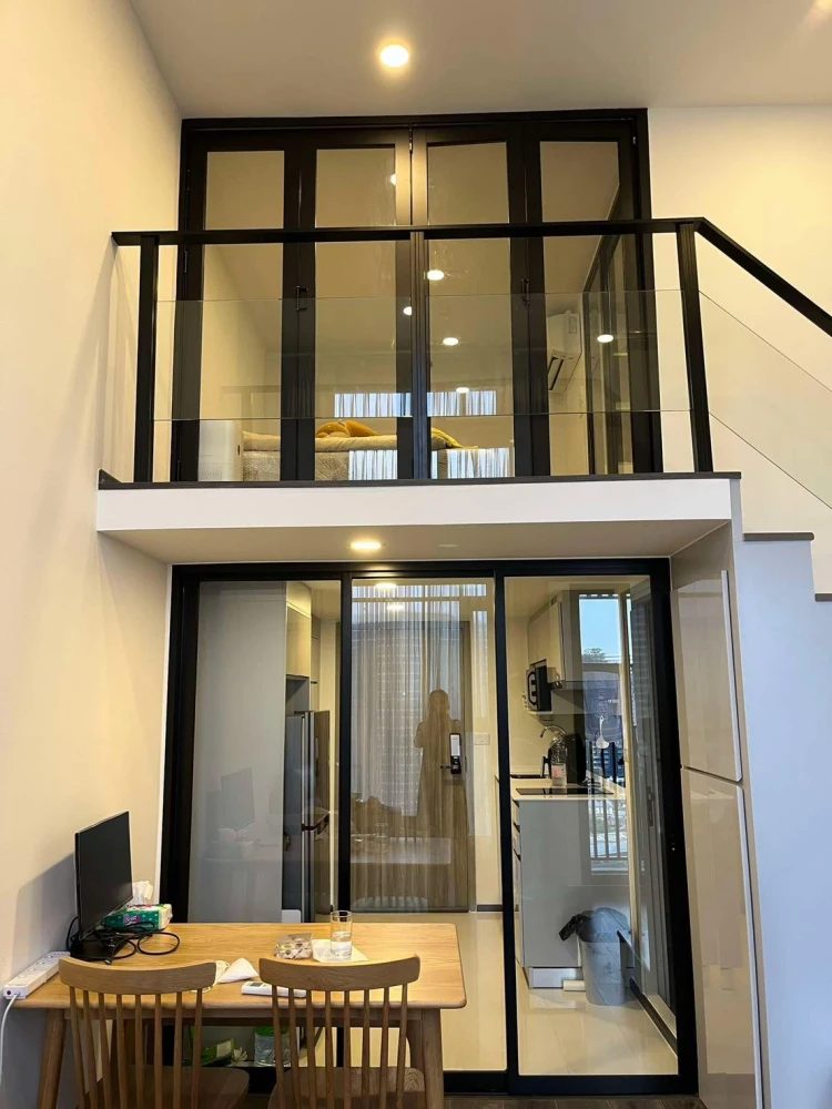 For rent: KnightsBridge Space Rachayothin. Spacious room with high ceilings, fully furnished, and beautiful view. Book now!