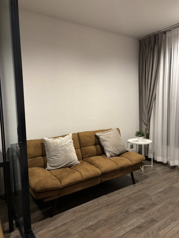 For rent: Life Ladprao Valley, 21st floor unit. Spacious living area, fully furnished and equipped with appliances. Don't miss out!