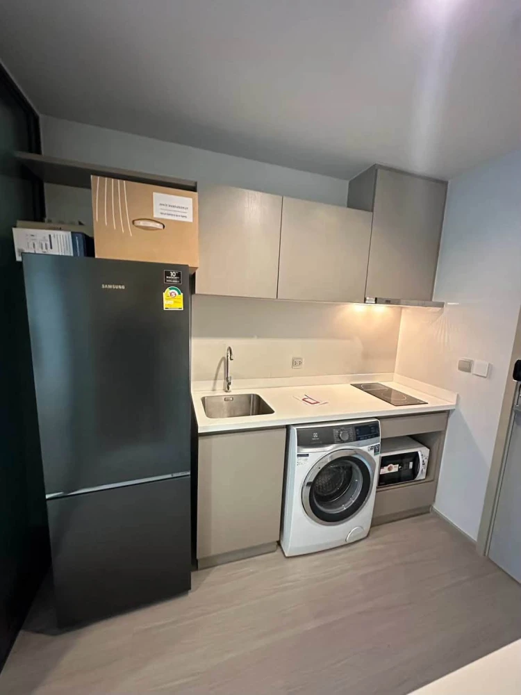 For rent: Life Ladprao, a lovely room with high-quality built-in furniture, in a great location with convenient transportation. Don't miss out!